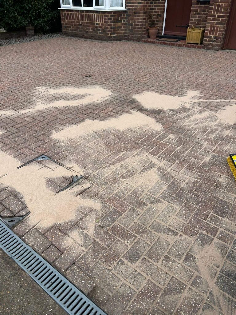 sanding in red brick pavers